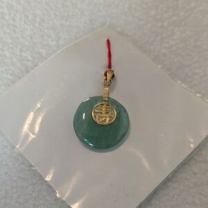 Elegant Green Pendant with Gold Accent